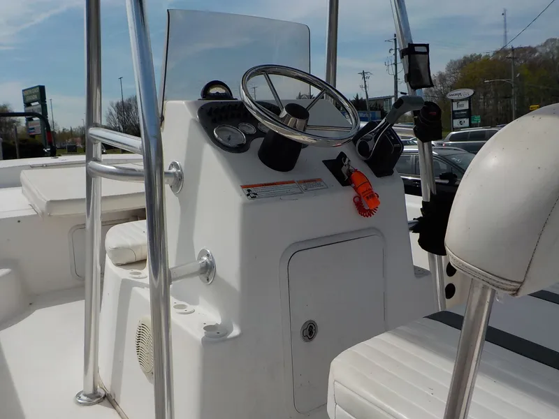 Slide: The Image of Steering console of a 2010 Carolina Skiff Elite Series DLV 218 boat. - 7