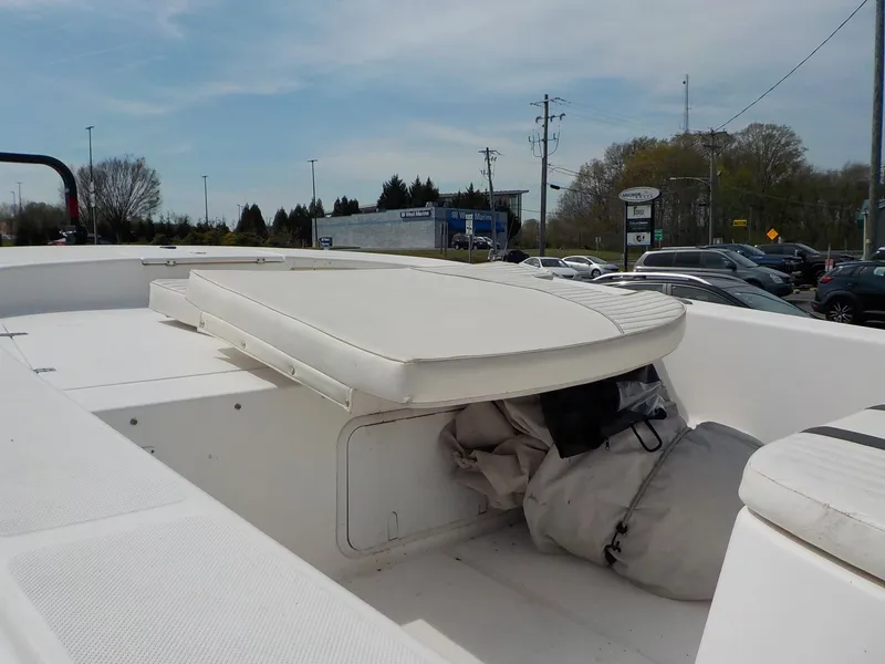 Slide: The Image of 2010 Carolina Skiff Elite Series DLV 218 boat with storage area. - 8