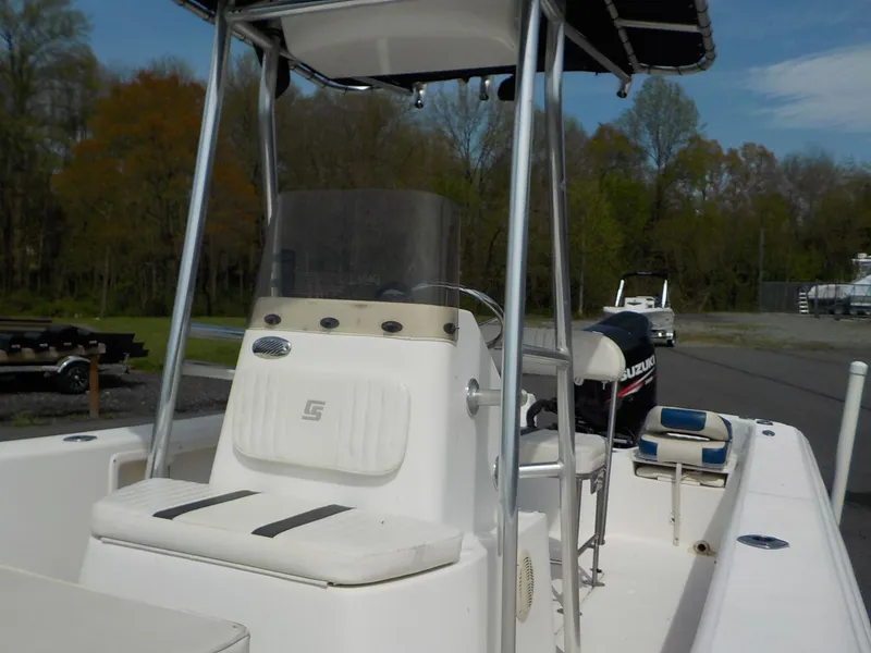 Slide: The Image of 2010 Carolina Skiff Elite Series DLV 218 boat with Suzuki engine. - 9
