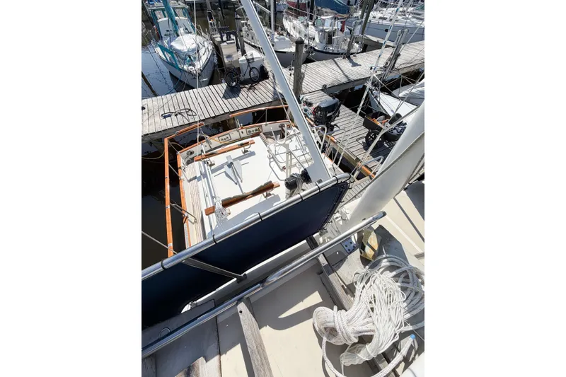 Slide: The Image of 1991 Grand Banks 36 Classic yacht docked at marina, view from above. - 21