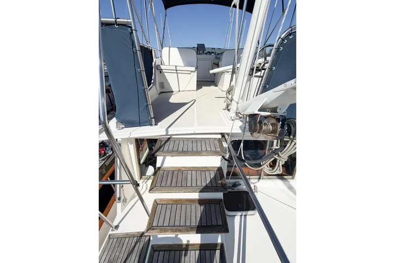Slide: The Image of Staircase leading to the deck of a 1991 Grand Banks 36 Classic yacht. - 24