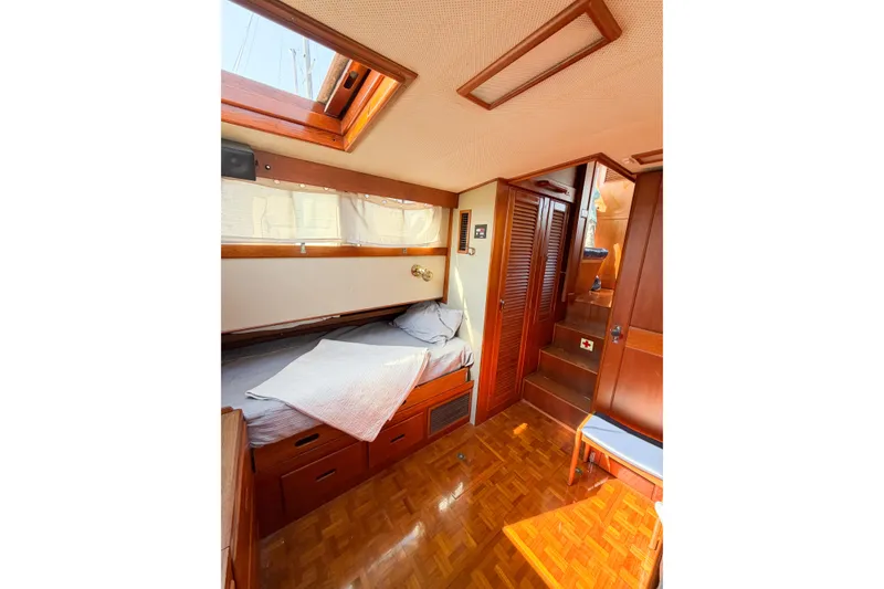 Slide: The Image of Cozy cabin interior of 1991 Grand Banks 36 Classic yacht with wooden furnishings. - 55