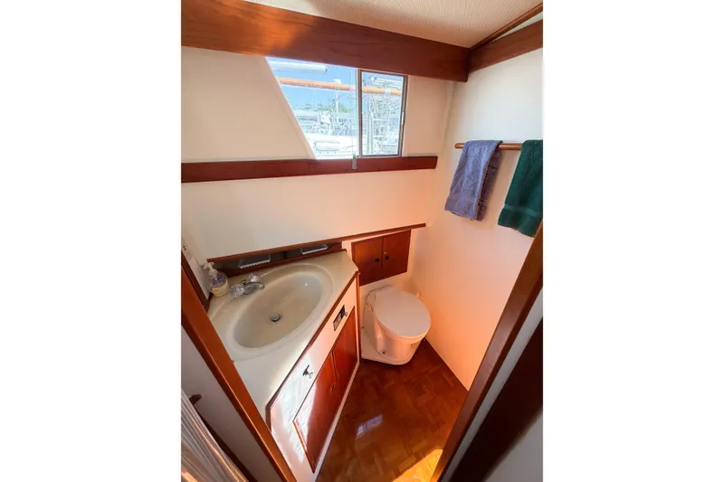 Slide: The Image of Bathroom interior of 1991 Grand Banks 36 Classic yacht with sink and toilet. - 66