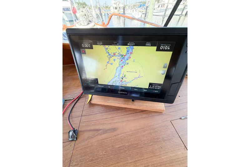 Slide: The Image of Garmin navigation display on 1991 Grand Banks 36 Classic boat, showing nautical chart. - 76