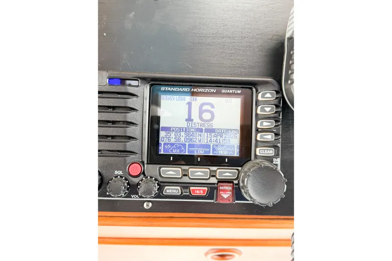Slide: The Image of Standard Horizon Quantum marine radio on 1991 Grand Banks 36 Classic boat. - 82