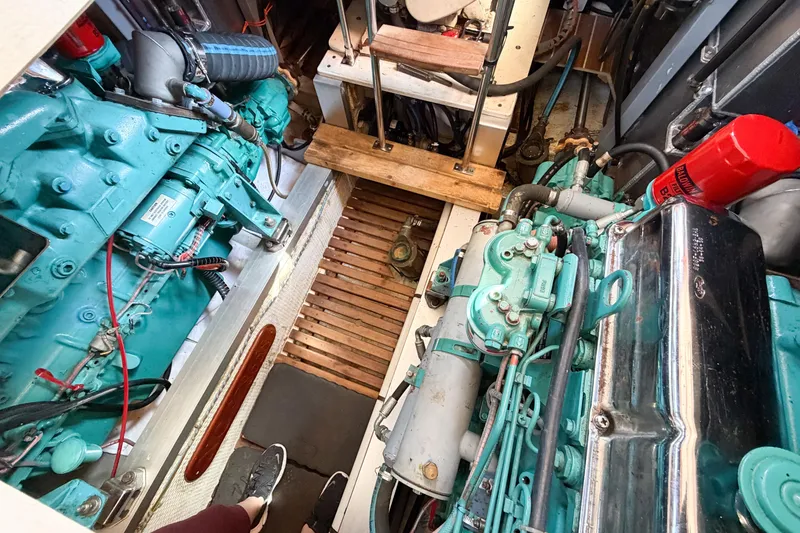 Slide: The Image of Engine room of a 1991 Grand Banks 36 Classic boat, showcasing mechanical components. - 91