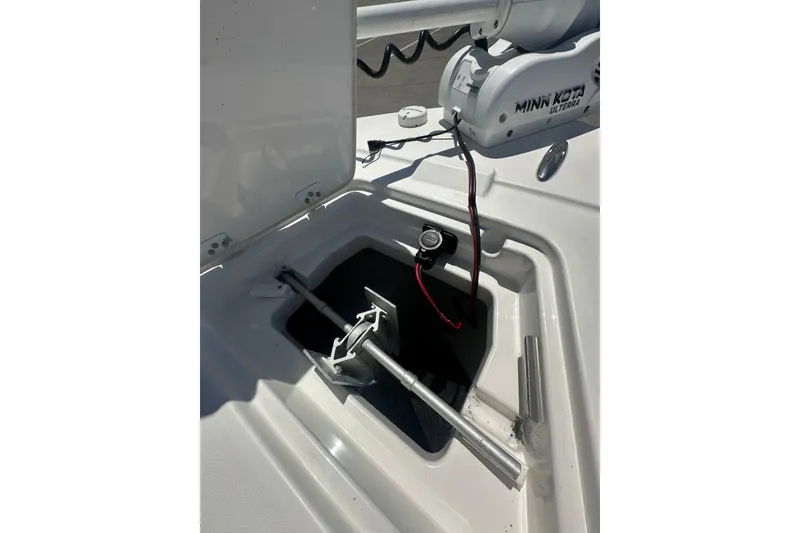 Slide: The Image of 2021 Caymas 28 HB boat anchor compartment with Minn Kota Ulterra trolling motor. - 17