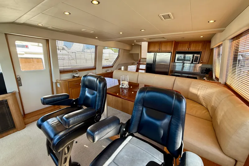 Slide: The Image of Luxurious interior of 2001 Pacific Mariner 65 Motoryacht with wooden cabinetry and modern amenities. - 15