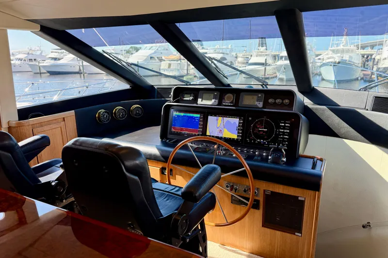 Slide: The Image of Interior of 2001 Pacific Mariner 65 Motoryacht with kitchen and wooden staircase. - 19