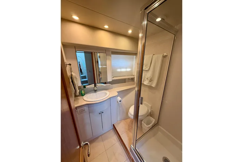 Slide: The Image of Cockpit of 2001 Pacific Mariner 65 Motoryacht with navigation and control systems. - 24