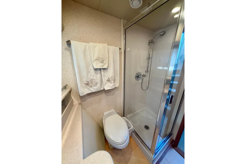 Slide: The Image of Cockpit of 2001 Pacific Mariner 65 Motoryacht with navigation equipment and steering wheel. - 26