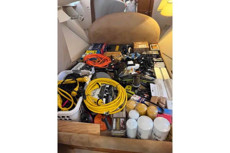 Slide: The Image of Luxurious bedroom interior of 2001 Pacific Mariner 65 Motoryacht with cozy bedding and ambient lighting. - 38