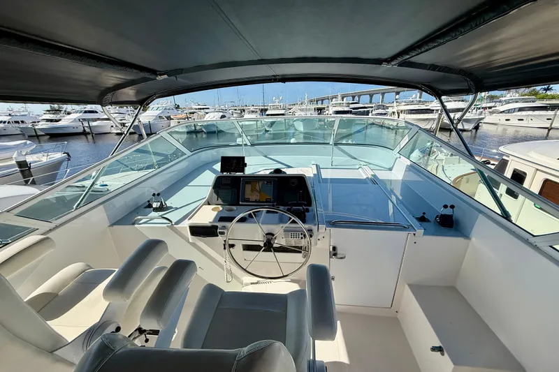 Slide: The Image of Cockpit view of 2001 Pacific Mariner 65 Motoryacht docked at marina. - 46