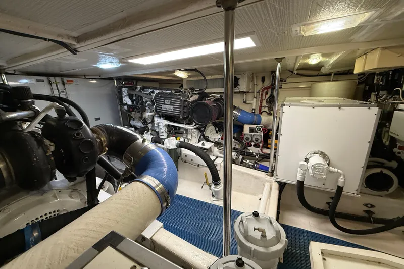 Slide: The Image of Engine room of 2001 Pacific Mariner 65 Motoryacht with CAT engine and mechanical components. - 56