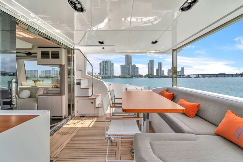 Slide: The Image of Luxurious interior of Azimut 60 Fly yacht, 2023, with cityscape view. - 12