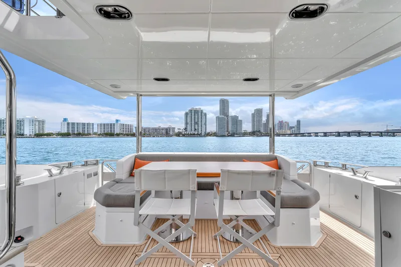 Slide: The Image of Azimut 60 Fly 2023 yacht with city skyline view. - 14
