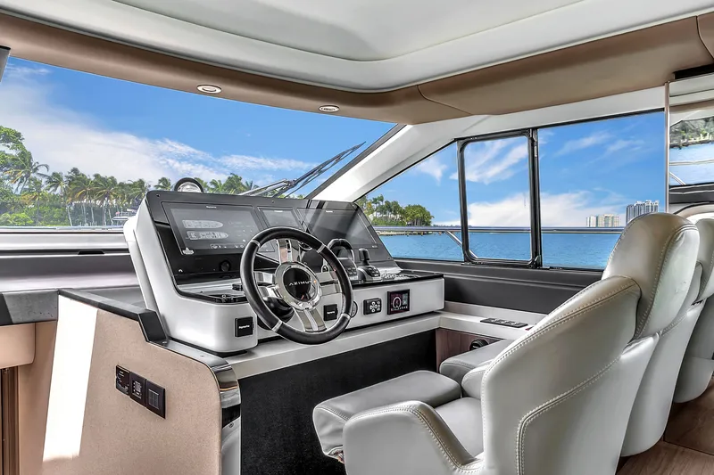 Slide: The Image of Interior of 2023 Azimut 60 Fly yacht with modern helm station. - 25