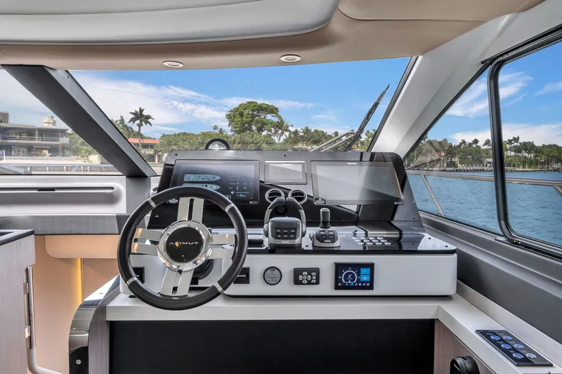 Slide: The Image of Interior view of the Azimut 60 Fly 2023 yacht helm. - 26