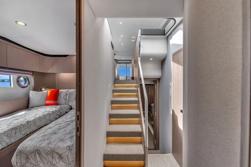 Slide: The Image of Interior of 2023 Azimut 60 Fly with staircase and bedroom. - 27