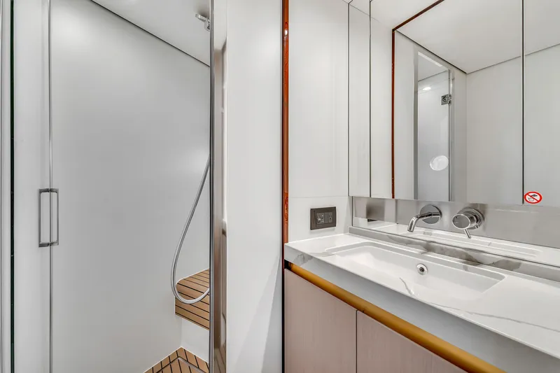 Slide: The Image of Luxurious bathroom on the 2023 Azimut 60 Fly yacht. - 33