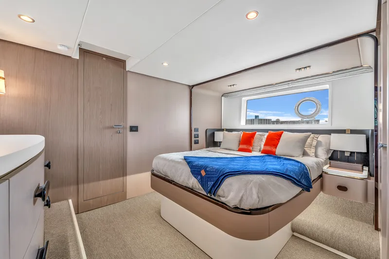 Slide: The Image of Luxurious bedroom on the 2023 Azimut 60 Fly yacht. - 35