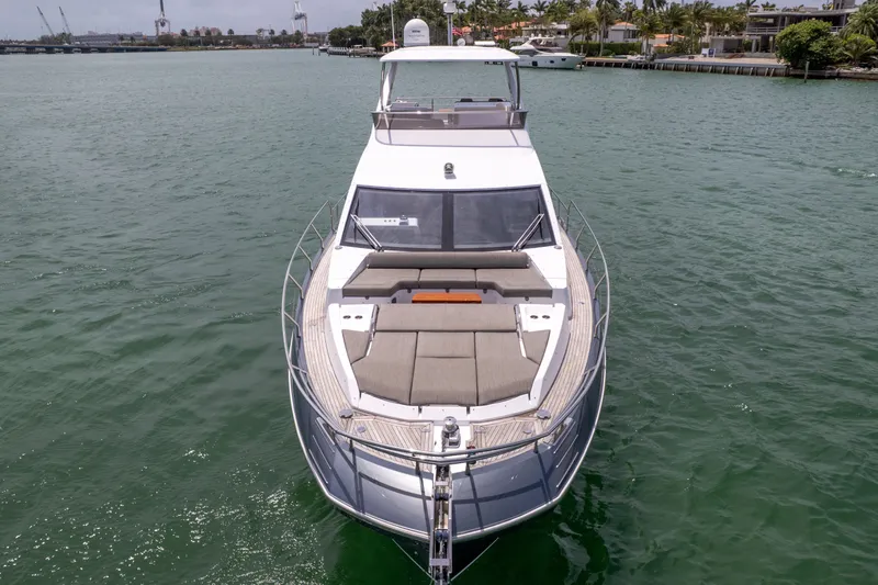 Slide: The Image of Azimut 60 Fly 2023 yacht on calm water, front view. - 4