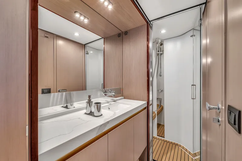 Slide: The Image of Luxurious bathroom on the 2023 Azimut 60 Fly yacht. - 40