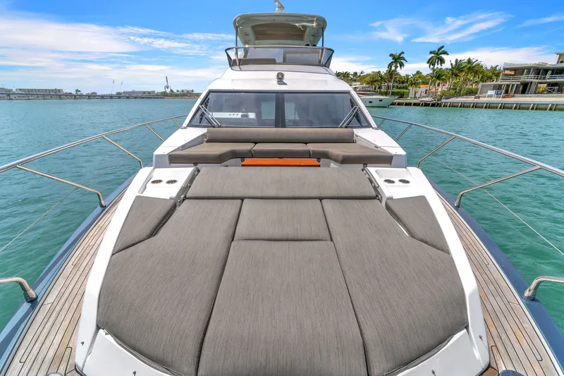 Slide: The Image of Azimut 60 Fly 2023 yacht with luxurious sun deck on calm waters. - 41