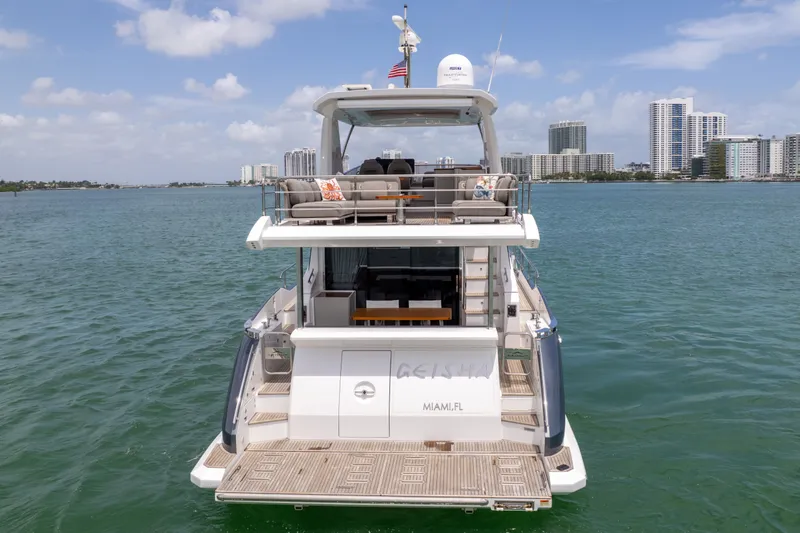 Slide: The Image of Azimut 60 Fly 2023 yacht in Miami with city skyline. - 8