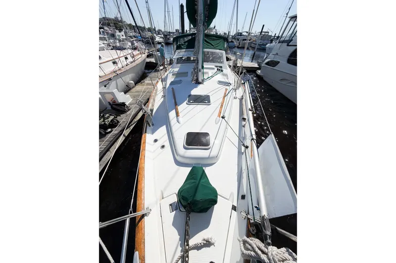 Slide: The Image of 2002 Beneteau Oceanis 42CC sailboat docked at marina, view of deck and rigging. - 16