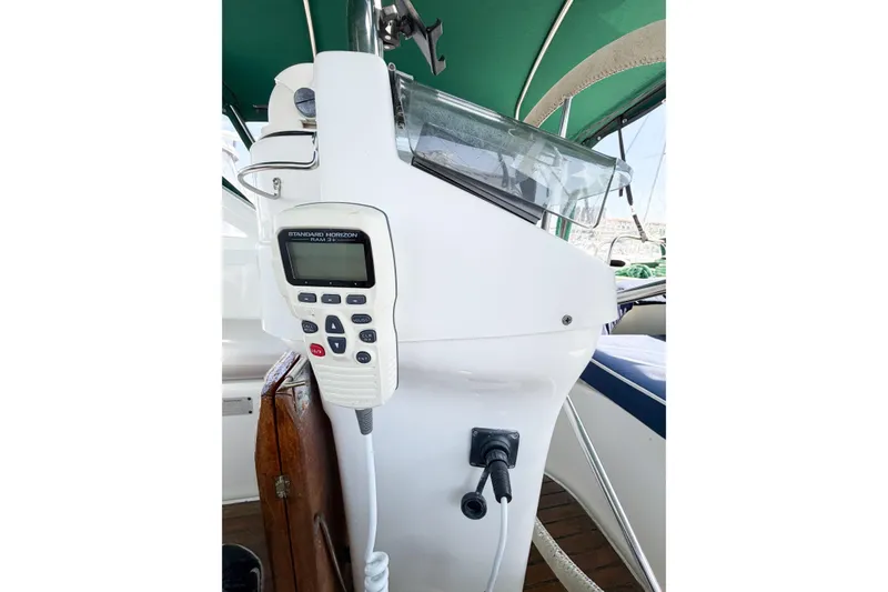 Slide: The Image of Cockpit of 2002 Beneteau Oceanis 42CC with Standard Horizon RAM mic and navigation equipment. - 35