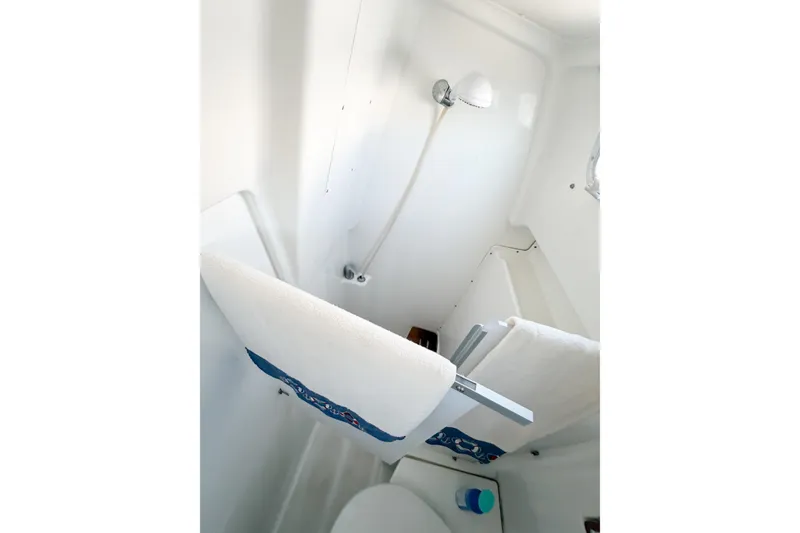 Slide: The Image of Beneteau Oceanis 42CC 2002 yacht bathroom with shower and towel rack. - 59