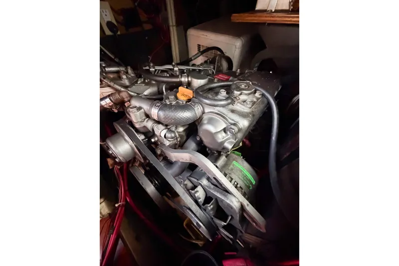 Slide: The Image of Engine of a 2002 Beneteau Oceanis 42CC sailboat, showcasing mechanical components. - 81