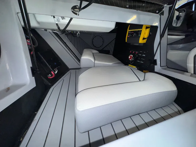 Slide: The Image of Interior of a 2025 Nautique Ski boat with modern seating. - 14