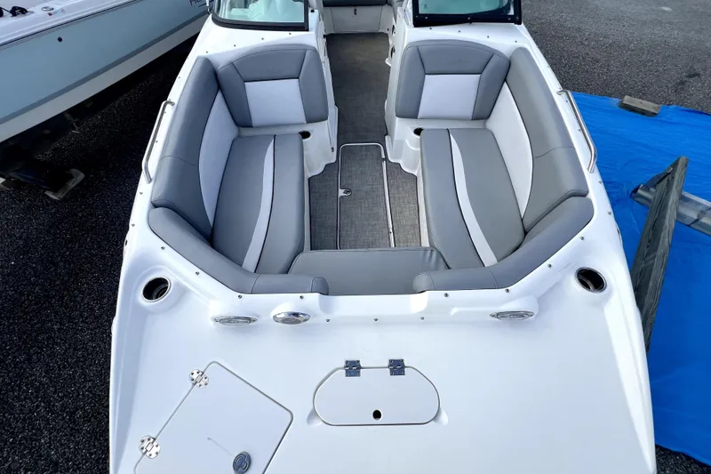 Slide: The Image of 2022 NauticStar 223DC Sport Deck boat with spacious seating and modern design. - 33