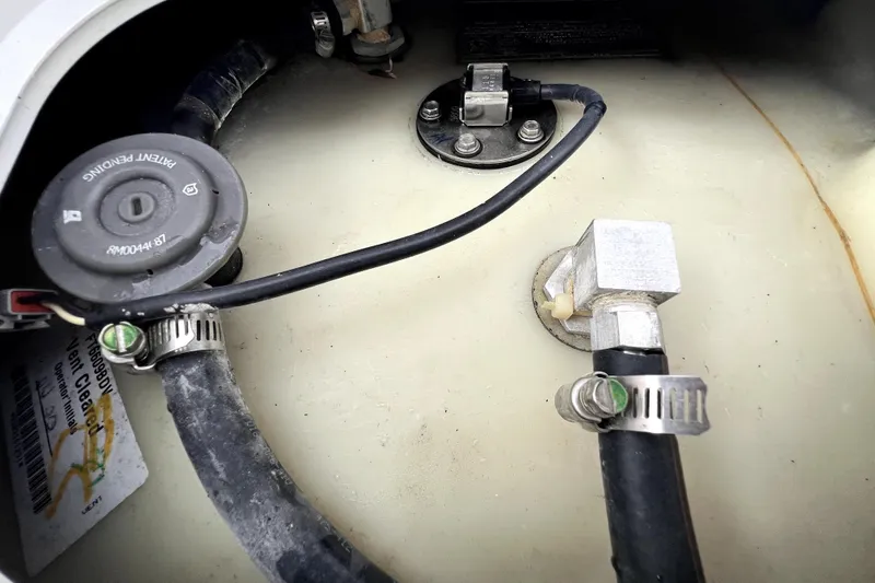 Slide: The Image of Fuel system components of a 2022 NauticStar 223DC Sport Deck boat. - 57