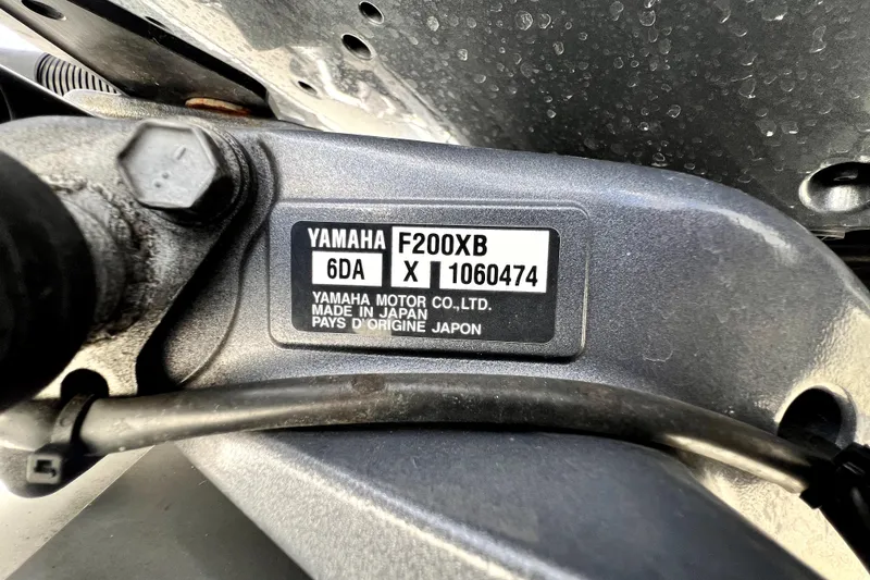 Slide: The Image of Close-up of Yamaha F200XB engine label on 2022 NauticStar 223DC Sport Deck. - 92