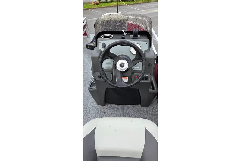 Slide: The Image of Steering console of 2026 Sun Tracker Bass Buggy 16 XL Select pontoon boat. - 3