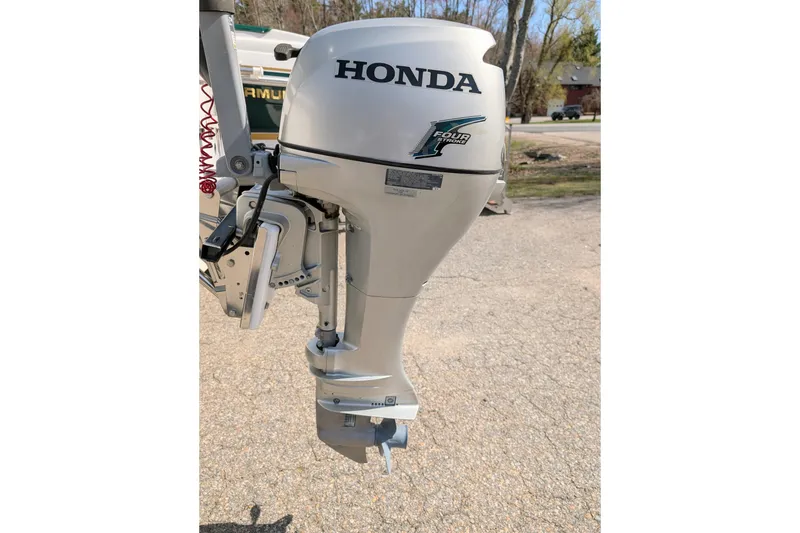 Slide: The Image of Honda outboard motor on a 2007 Catalina 22 Mark II sailboat. - 10