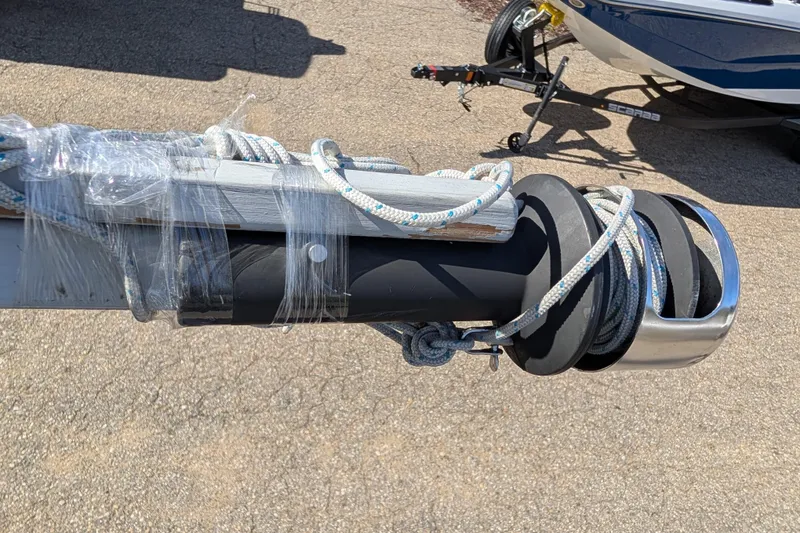 Slide: The Image of Catalina 22 Mark II 2007 sailboat mast with wrapped ropes and fittings. - 18