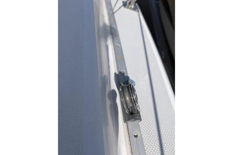 Slide: The Image of Close-up of a 2007 Catalina 22 Mark II sailboat deck detail. - 8