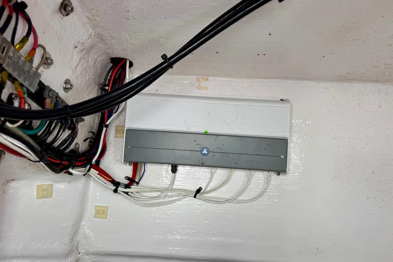 Slide: The Image of Electrical wiring and components inside a 2010 Contender 21 Open boat. - 10