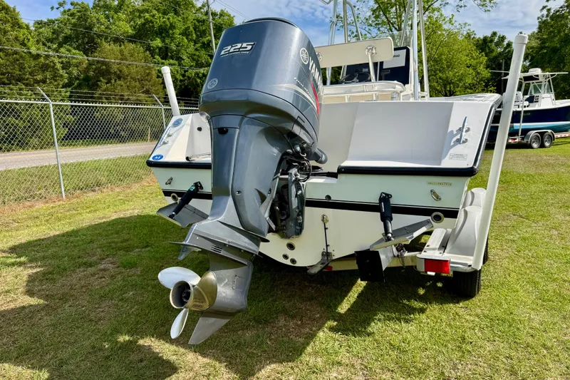Slide: The Image of 2010 Contender 21 Open boat with Yamaha 225 outboard motor on trailer. - 4