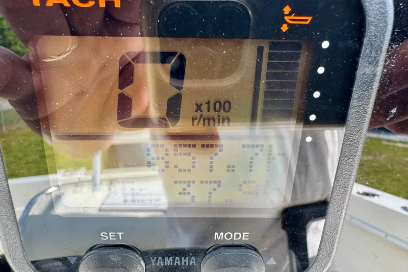 Slide: The Image of Close-up of a Yamaha tachometer on a 2010 Contender 21 Open boat. - 9