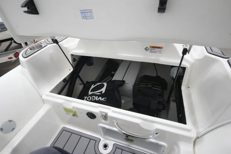 Slide: The Image of Zodiac Yachtline 440 DL NEO 60hp storage compartment, year 2026. - 10
