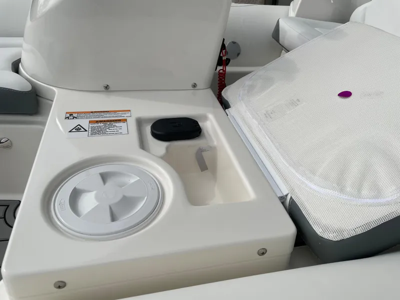 Slide: The Image of Zodiac Yachtline 440 DL NEO 2026, console with cup holder. - 21