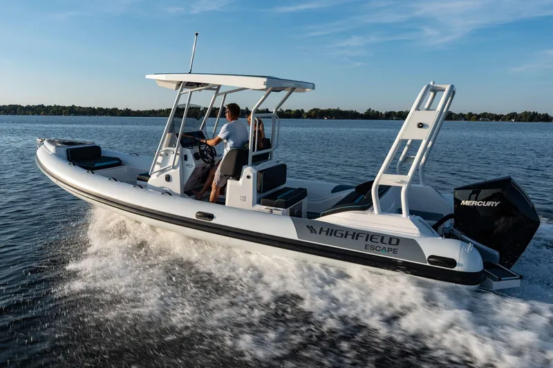 Slide: The Image of Manufacturer Provided Image: 2025 Highfield Escape 750 boat cruising on a lake with passengers. - 3