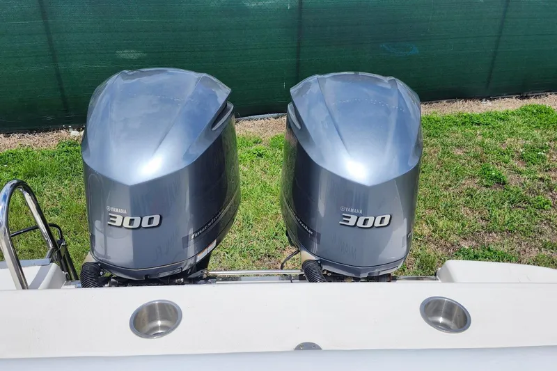Slide: The Image of Twin Yamaha 300 engines on a 2015 Robalo R300 Center Console boat. - 14
