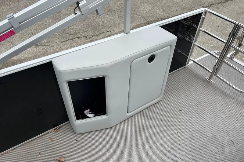 Slide: The Image of Interior view of 2023 Godfrey Sweetwater 2286 pontoon boat with storage compartment. - 10