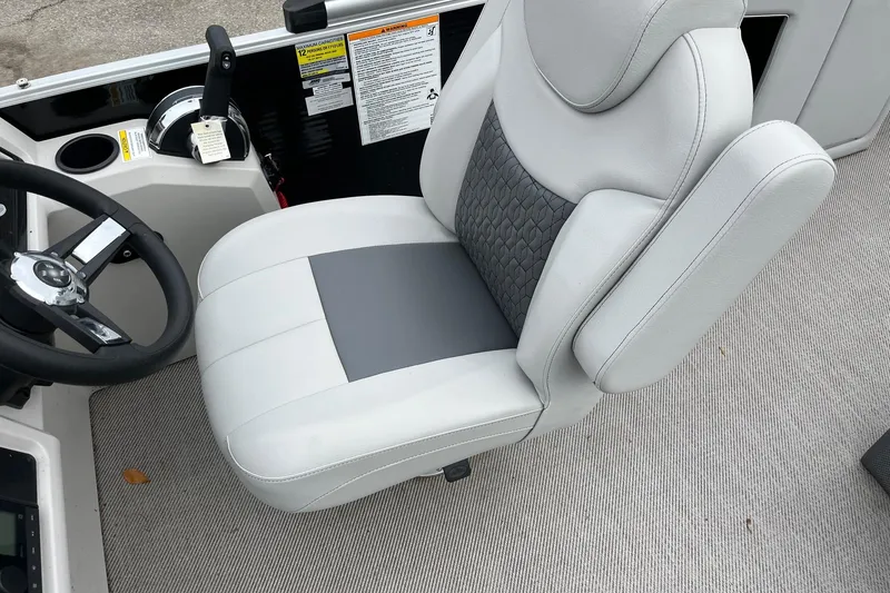 Slide: The Image of Captain's chair in 2023 Godfrey Sweetwater 2286 boat, featuring sleek design and comfortable upholstery. - 8